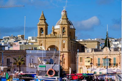 View of buildings against sky in city