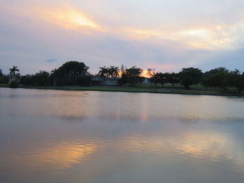 Scenic view of lake against sky during sunset