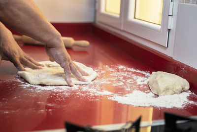 Midsection of person preparing food