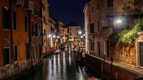 Illuminated buildings in city at night