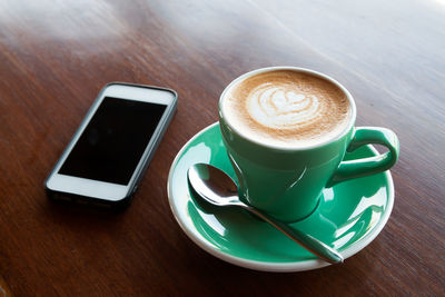 Coffee cup on table