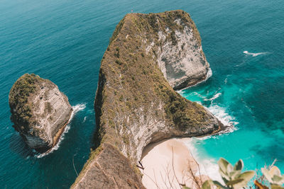 High angle view of rock formation in sea