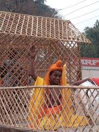 Portrait of chainlink fence in cage