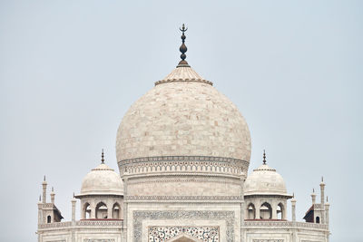 Low angle view of mosque against clear sky