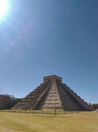 View of temple against clear blue sky
