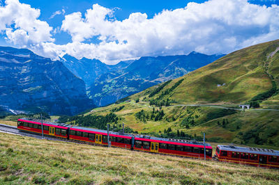 High angle view of railroad tracks against mountains