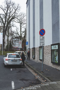 Road sign on street in city