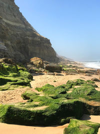 Scenic view of rocky mountains against clear sky