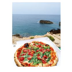 View of pizza on sea against clear sky