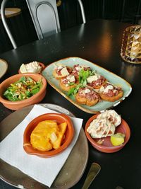 High angle view of food served on table