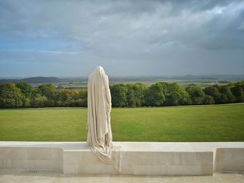 Canada mourns statue detail at the canadian ww1 memorial at vimy, france.