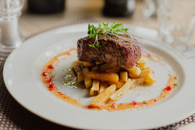 Close-up of food in plate on table