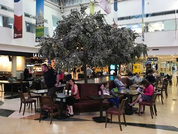 People sitting on table in cafe