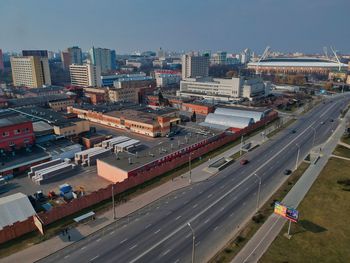 High angle view of vehicles on road in city