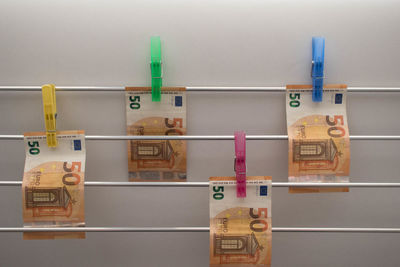 Close-up of multi colored pencils on wall