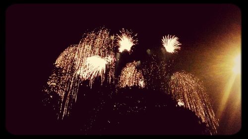 Low angle view of firework display