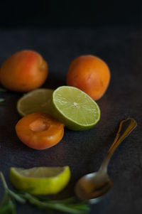 Close-up of oranges on table