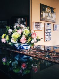 Various flowers on table