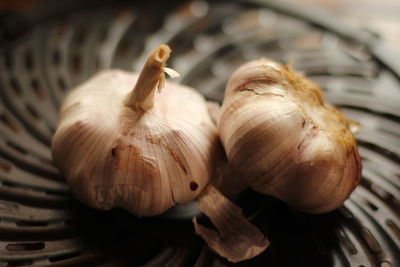 Close-up of garlic on table