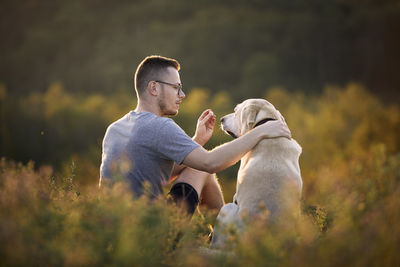 Young man with dog