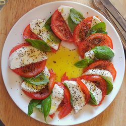 Close-up of caprese salad served on plate