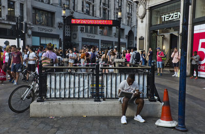 People on street in city