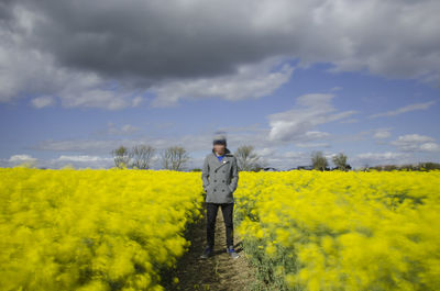 Full length of a man standing on field