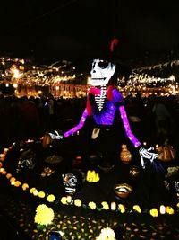 Full frame shot of illuminated lanterns hanging at night