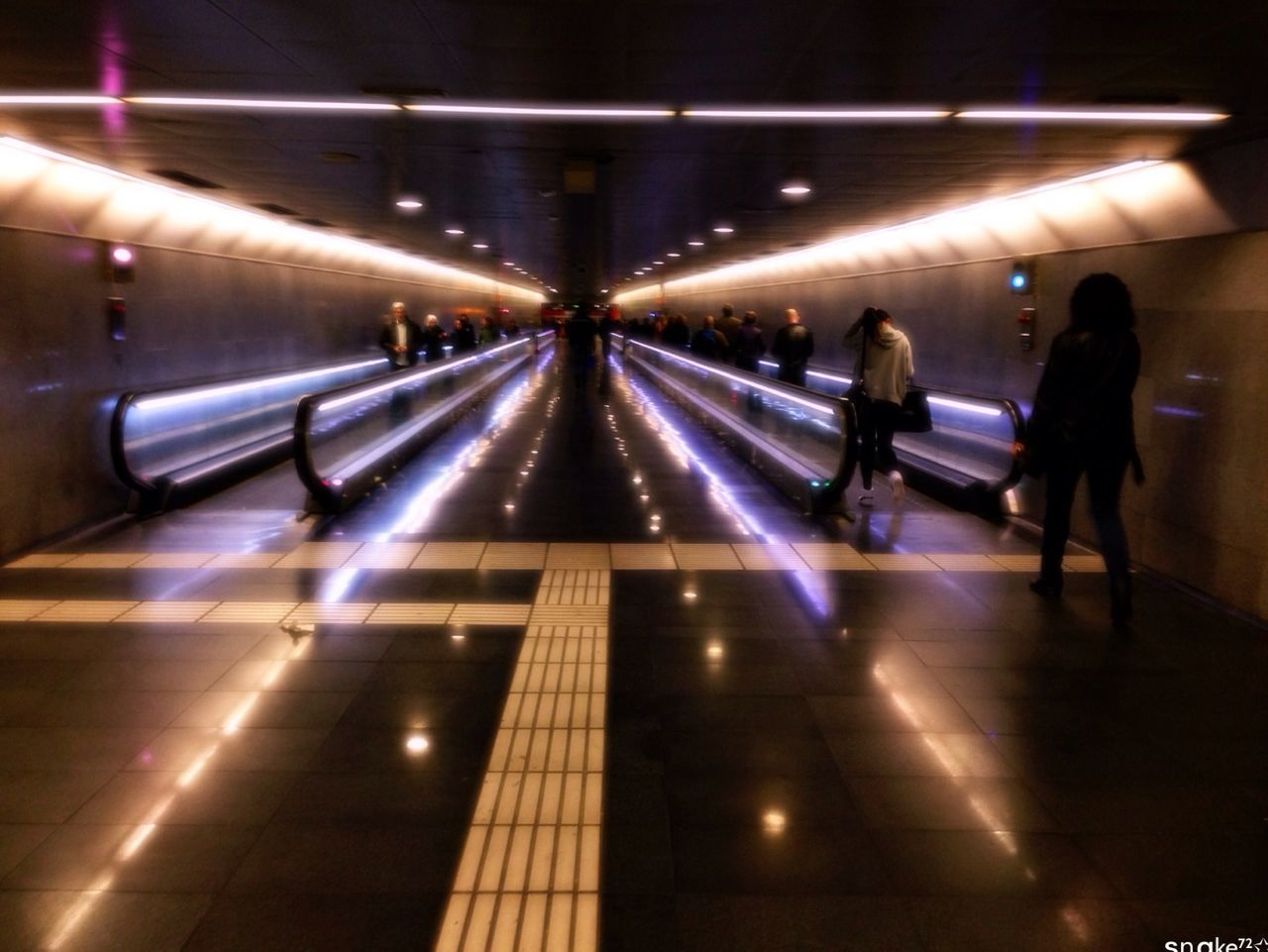 illuminated, indoors, night, transportation, men, railroad station, railroad station platform, subway station, subway, lighting equipment, walking, public transportation, lifestyles, city life, architecture, built structure, travel, on the move, person