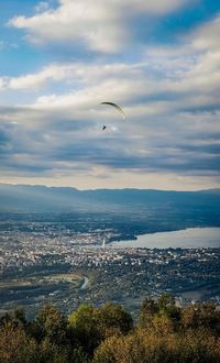 Aerial view of city against sky