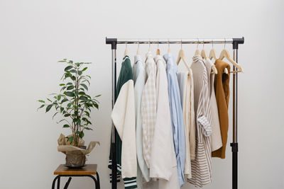 Close-up of clothes hanging on rack