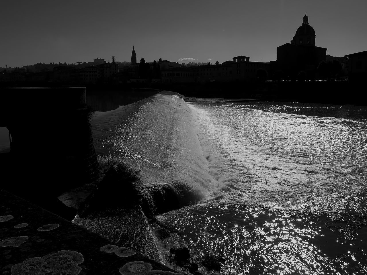 MAN SPLASHING WATER IN SKY