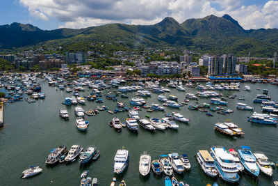 High angle view of boats moored in harbor