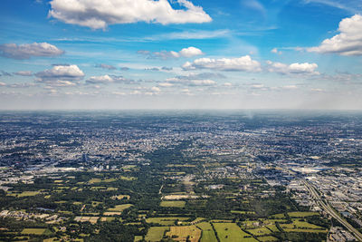 Aerial view of city against sky