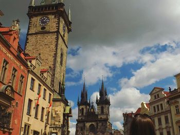 Low angle view of church against cloudy sky