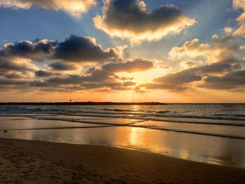 Scenic view of sea at sunset