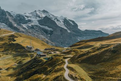 Scenic view of snowcapped mountains against sky