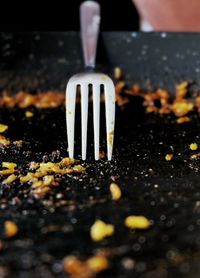 Close-up of person in container