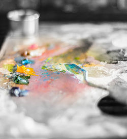 Close-up of multi colored pencils on table