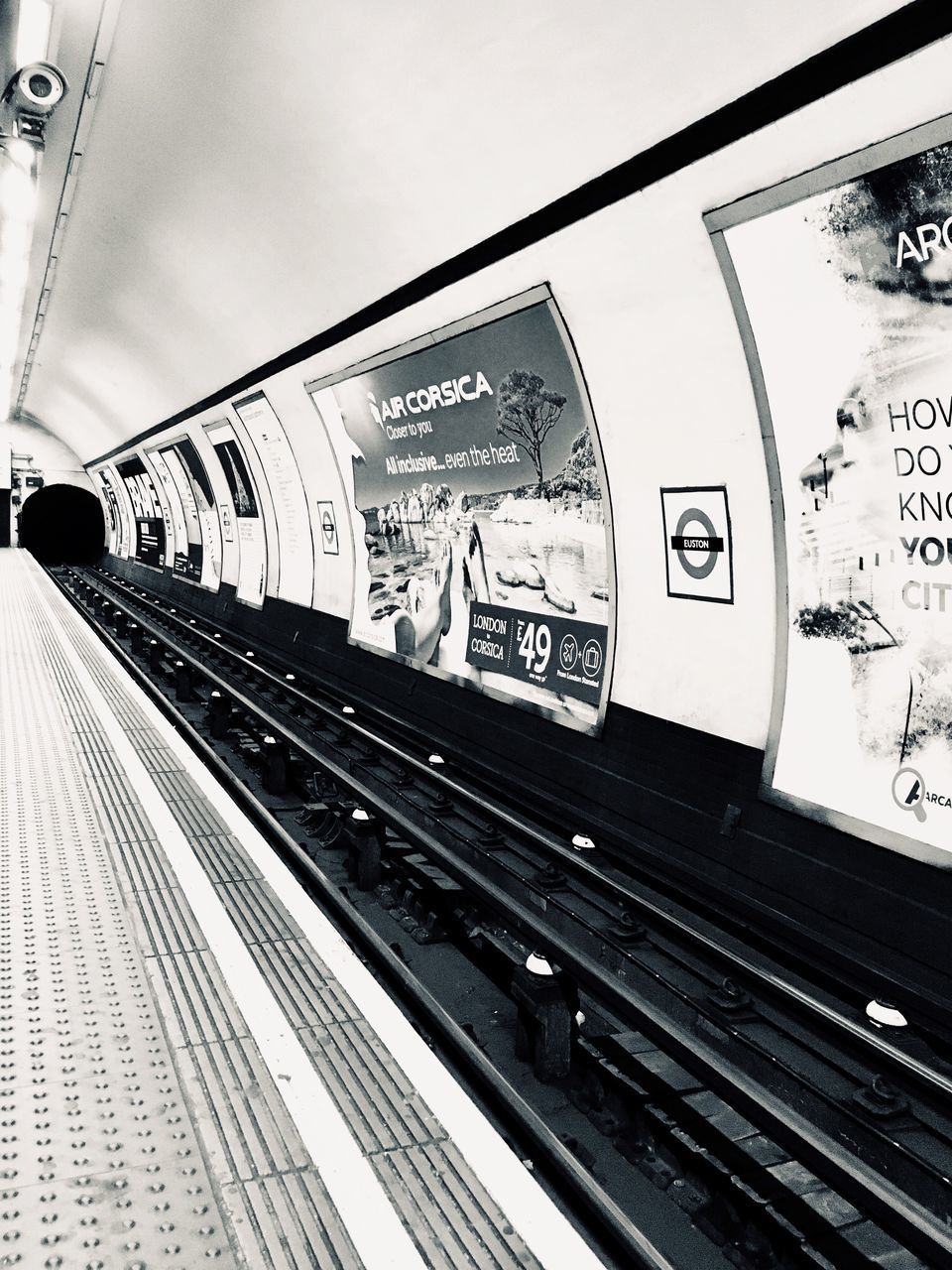 RAILROAD STATION PLATFORM AGAINST SKY