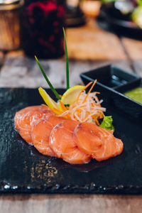 Close-up of sushi served on table