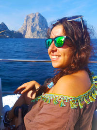 Tourist girl on vacation in the mediterranean sea in ibiza in front of es vedra in cala d'hort