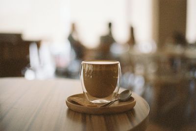 Close-up of coffee cup on table