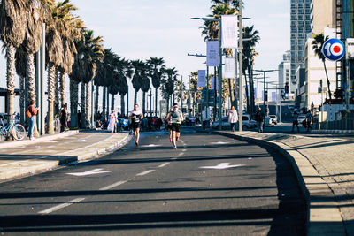 People on road against sky
