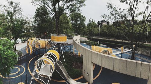 Panoramic shot of park by swimming pool