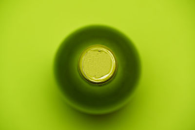 High angle view of drink on green surface