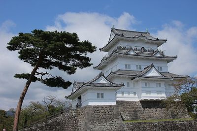 View of bell tower against cloudy sky