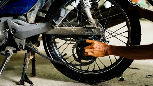 Man with bicycle on metal