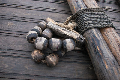 High angle view of wooden buoys