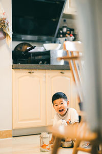 Portrait of boy at home